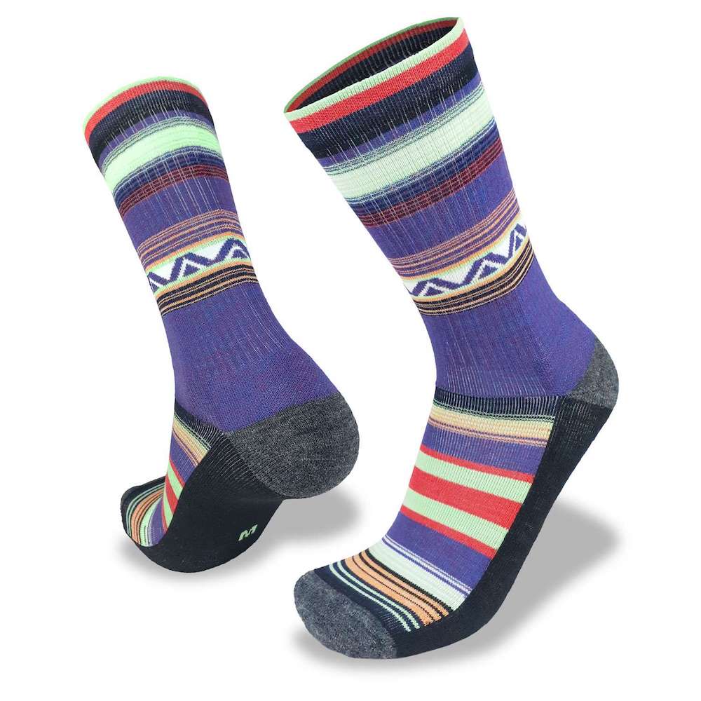 Merino wool cycling socks. Multi Coloured sock with aztec prism band in vertical orientation in a pair with model feet standing on tip toes.