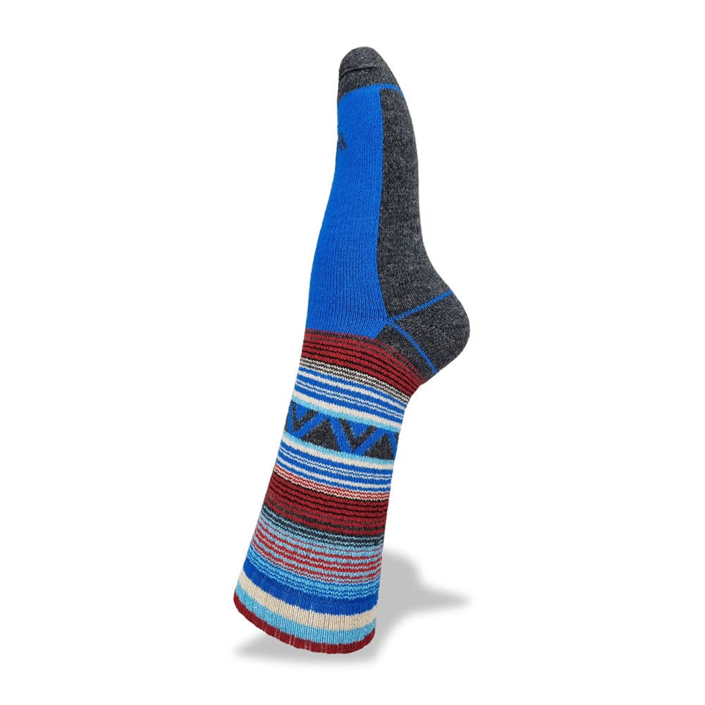 Merino wool bike packing socks. Multi Coloured sock in vertical orientation upside down with toe pointing upwards.